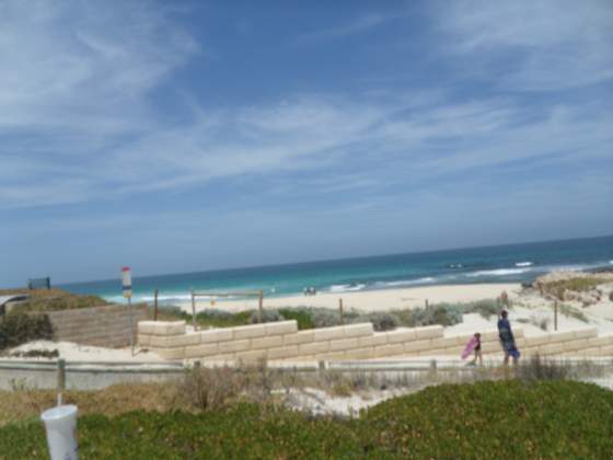 View of beach from parking lot